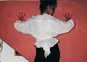 Emilia Gallo modeling White Organza Blouse and Black Stirrup pants: 1st clothes made in NYC.