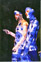 Masked and hooded in daisy spandex a la Robert Presley