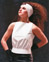 White leather turban and top, blade leather skirt on Emilia Gallo.