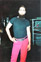 Darren Corey in an open knit shirt and cords